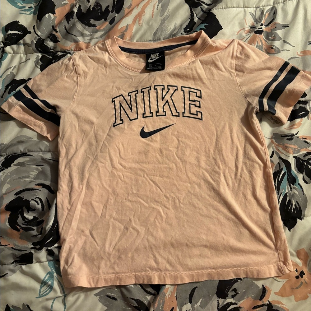 Pale pink nike shirt